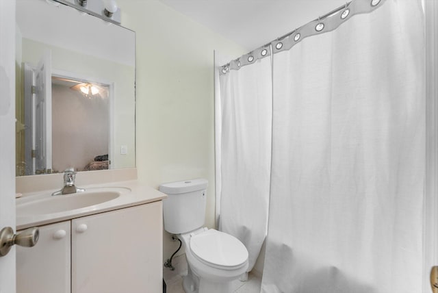3518 Shoma Dr, Royal Palm Beach, FL 33414 - bathroom featuring toilet, tile patterned floors, vanity, and shower / tub combo with curtain