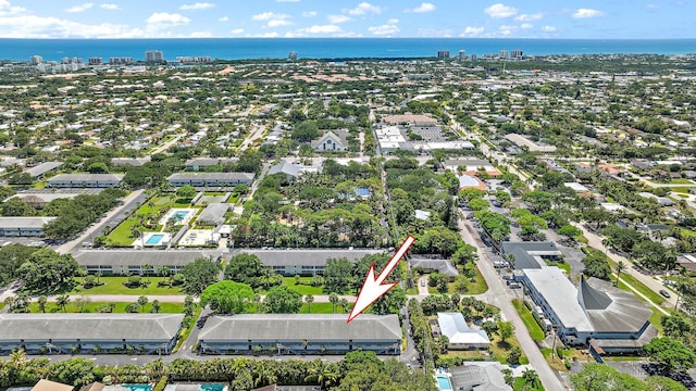 aerial view of property's location featuring a large body of water