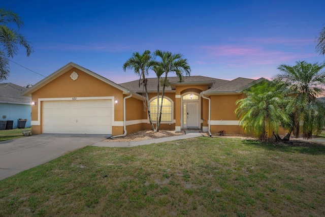 632 SW Mccall Rd, Port Saint Lucie, FL 34953 - single story home with stucco siding, an attached garage, driveway, and a lawn