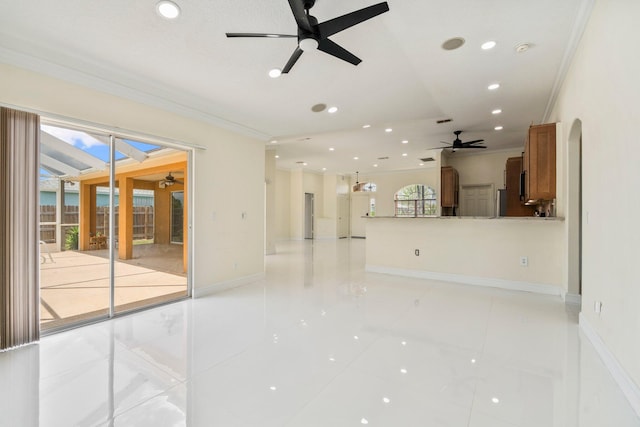 632 SW Mccall Rd, Port Saint Lucie, FL 34953 - unfurnished living room featuring ceiling fan, recessed lighting, baseboards, light tile patterned floors, and crown molding