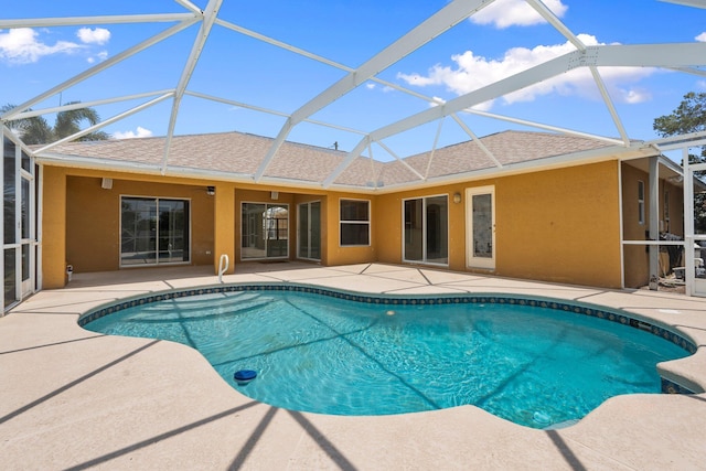 632 SW Mccall Rd, Port Saint Lucie, FL 34953 - outdoor pool featuring a patio and glass enclosure