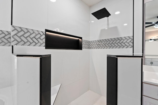 632 SW Mccall Rd, Port Saint Lucie, FL 34953 - bathroom featuring tiled shower and vanity