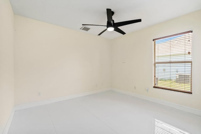 632 SW Mccall Rd, Port Saint Lucie, FL 34953 - tiled empty room featuring plenty of natural light, a ceiling fan, and baseboards