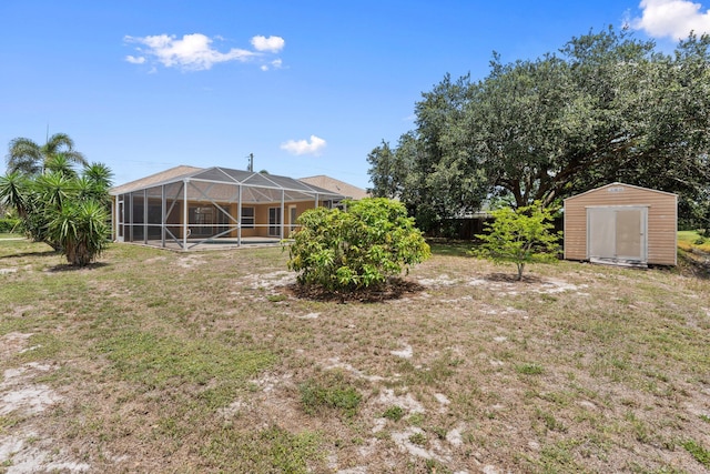 632 SW Mccall Rd, Port Saint Lucie, FL 34953 - view of grassy yard with glass enclosure