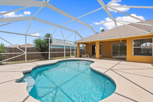 632 SW Mccall Rd, Port Saint Lucie, FL 34953 - view of pool featuring a patio, a ceiling fan, and glass enclosure
