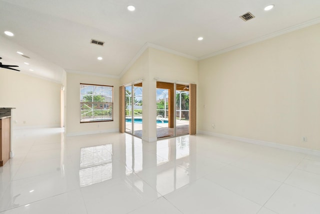632 SW Mccall Rd, Port Saint Lucie, FL 34953 - unfurnished room featuring crown molding, recessed lighting, baseboards, light tile patterned floors, and lofted ceiling
