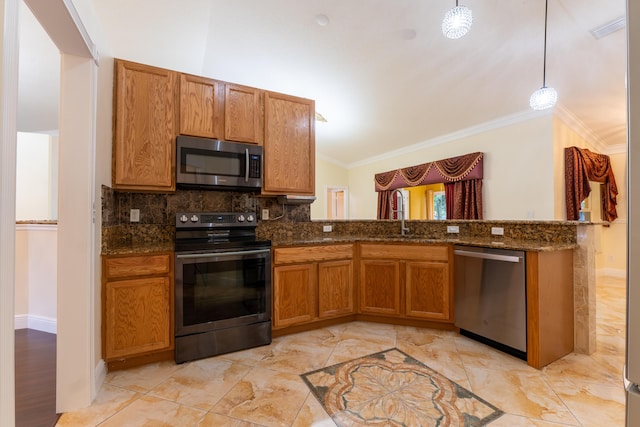 2853 SE Melaleuca Blvd, Port Saint Lucie, FL 34952 - kitchen featuring stainless steel appliances, crown molding, decorative backsplash, brown cabinets, and pendant lighting
