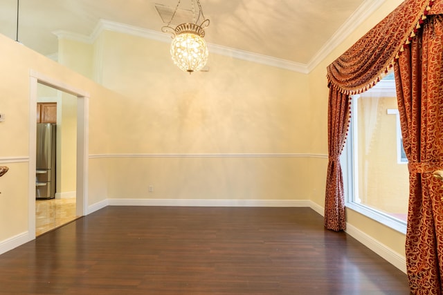 2853 SE Melaleuca Blvd, Port Saint Lucie, FL 34952 - spare room featuring dark wood-style floors, crown molding, and a chandelier
