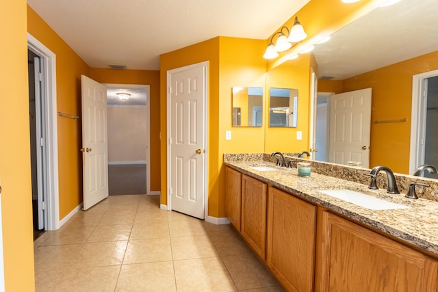 2853 SE Melaleuca Blvd, Port Saint Lucie, FL 34952 - full bathroom with double vanity and tile patterned floors