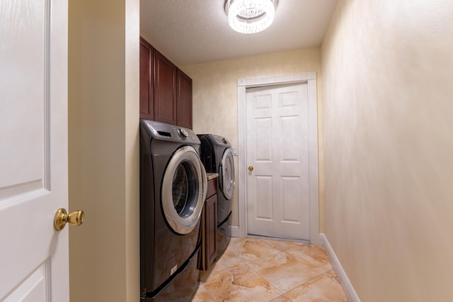 2853 SE Melaleuca Blvd, Port Saint Lucie, FL 34952 - laundry area with independent washer and dryer, cabinet space, and light tile patterned floors