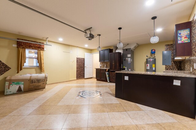 2853 SE Melaleuca Blvd, Port Saint Lucie, FL 34952 - kitchen featuring electric water heater, backsplash, electric panel, recessed lighting, and light tile patterned floors