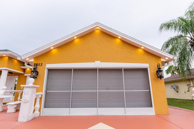 2853 SE Melaleuca Blvd, Port Saint Lucie, FL 34952 - garage with driveway
