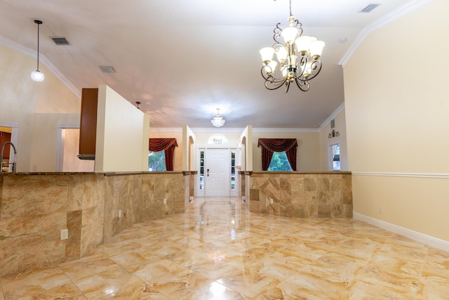 2853 SE Melaleuca Blvd, Port Saint Lucie, FL 34952 - kitchen with healthy amount of natural light, a chandelier, marble tiled flooring, ornamental molding, and pendant lighting