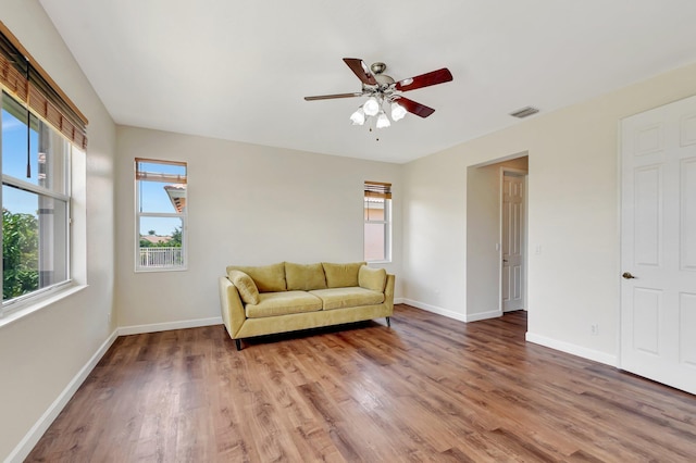 116 Ibisca Ter, Royal Palm Beach, FL 33411 - sitting room with light wood-style floors, a ceiling fan, and baseboards