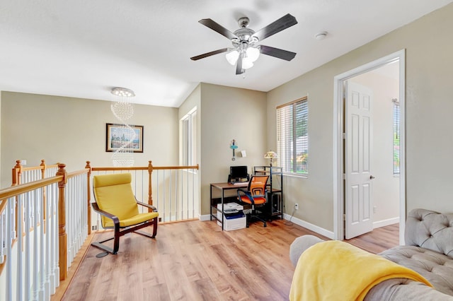 116 Ibisca Ter, Royal Palm Beach, FL 33411 - sitting room featuring a desk, light wood-style floors, ceiling fan, and baseboards
