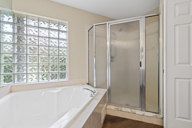 6342 120th Ave N, The Acreage, FL 33412 - full bathroom featuring a shower stall, a bath, and wood finished floors