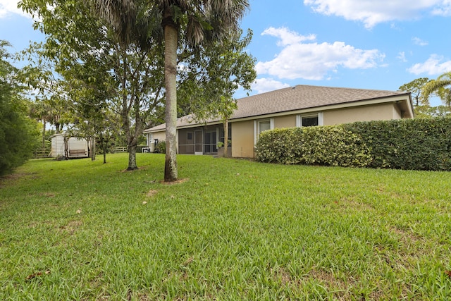 6342 120th Ave N, The Acreage, FL 33412 - view of grassy yard with a sunroom