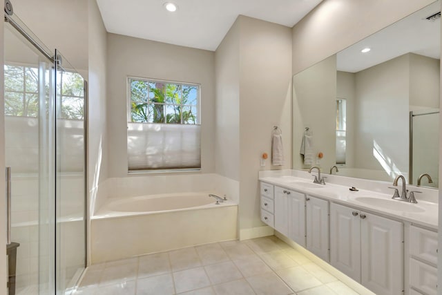 2211 Vero Beach Ln, West Palm Beach, FL 33411 - bathroom featuring a bath, tile patterned flooring, double vanity, recessed lighting, and a shower with door