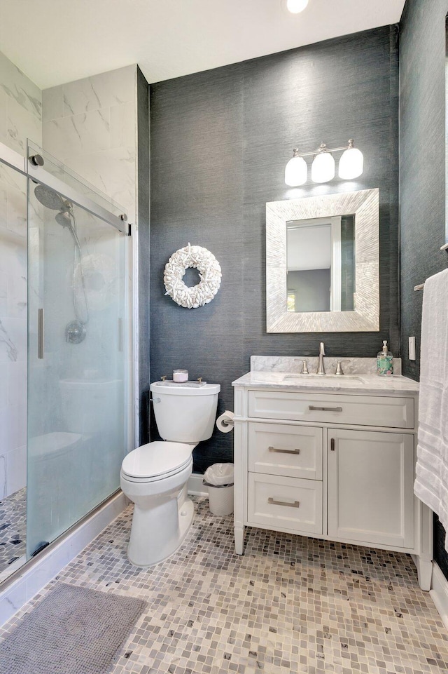 2211 Vero Beach Ln, West Palm Beach, FL 33411 - bathroom with toilet, a shower stall, and vanity
