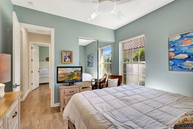 2211 Vero Beach Ln, West Palm Beach, FL 33411 - bedroom featuring light wood-type flooring, a closet, ceiling fan, and a skylight