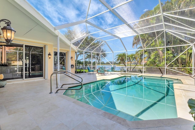 2211 Vero Beach Ln, West Palm Beach, FL 33411 - swimming pool with a patio and a lanai