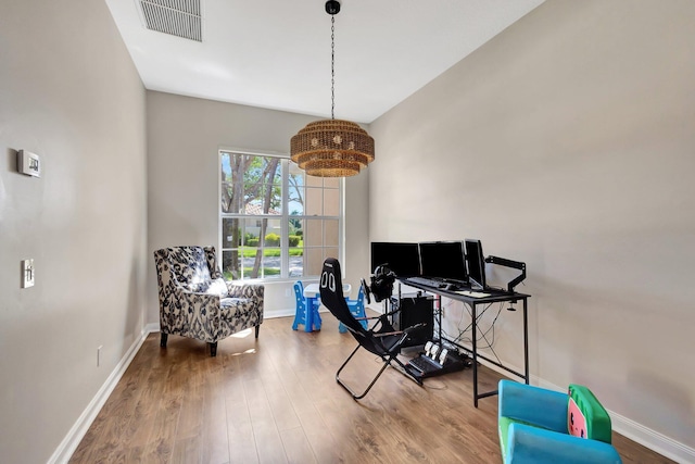 2211 Vero Beach Ln, West Palm Beach, FL 33411 - office area featuring baseboards and wood finished floors