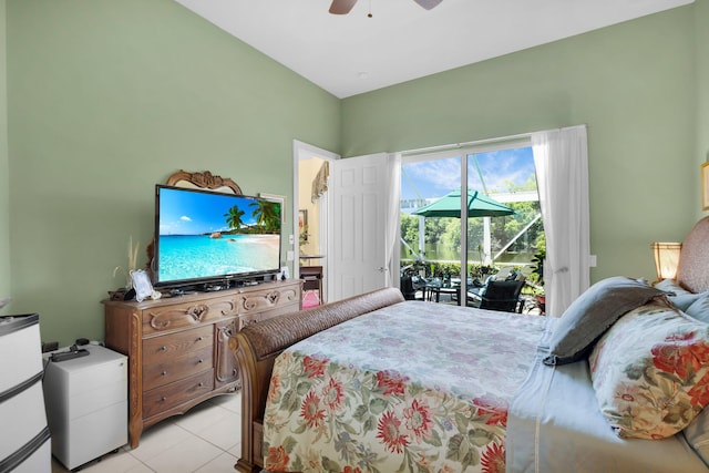 bedroom with access to outside, light tile patterned floors, and ceiling fan