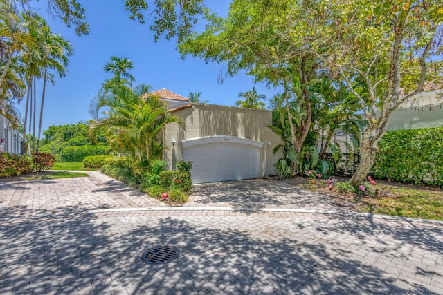 garage with driveway