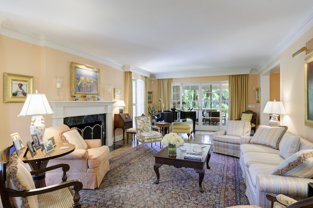 218 El Brillo Way, Palm Beach, FL 33480 - living area featuring ornamental molding, a fireplace, and wood finished floors