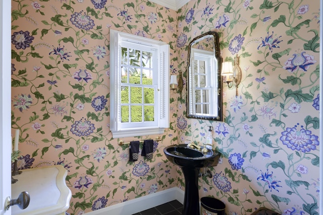 218 El Brillo Way, Palm Beach, FL 33480 - half bath with wallpapered walls, baseboards, crown molding, and tile patterned flooring