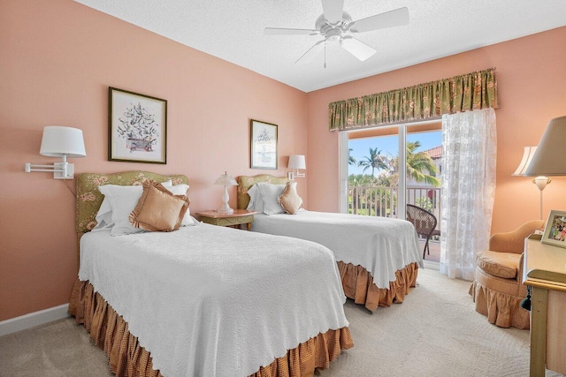 5900 Old Ocean Blvd Unit C6, Ocean Ridge, FL 33435 - bedroom with light colored carpet, access to exterior, a ceiling fan, and baseboards