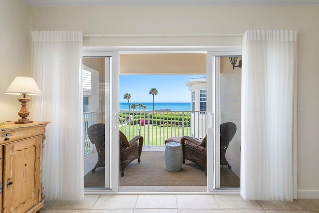 5900 Old Ocean Blvd Unit C6, Ocean Ridge, FL 33435 - living area featuring a water view and tile patterned flooring