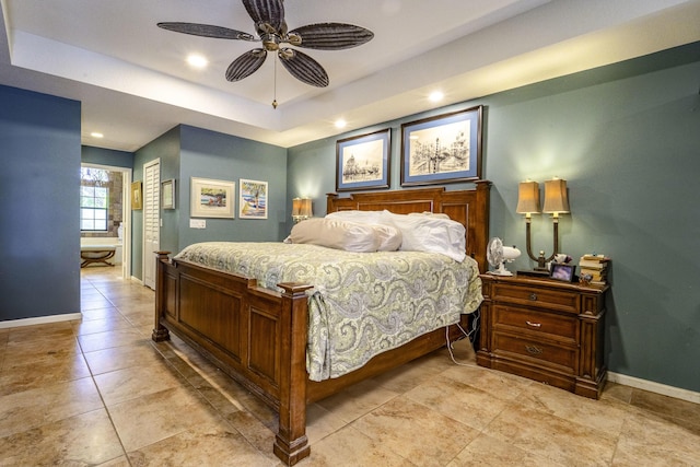 bedroom with baseboards, recessed lighting, a raised ceiling, a ceiling fan, and a closet