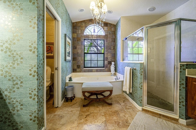 bathroom featuring vaulted ceiling, a chandelier, a shower stall, a bath, and toilet