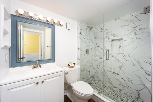 9800 S Ocean Dr Unit 415, Jensen Beach, FL 34957 - full bath featuring a marble finish shower, toilet, and vanity