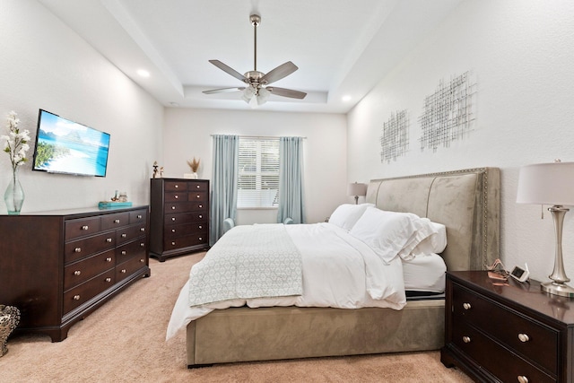 3552 SW Dellamano St, Port Saint Lucie, FL 34953 - bedroom featuring light carpet, a raised ceiling, and a ceiling fan