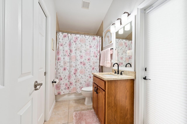 3552 SW Dellamano St, Port Saint Lucie, FL 34953 - full bathroom featuring tile patterned floors, vanity, and toilet
