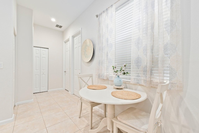 3552 SW Dellamano St, Port Saint Lucie, FL 34953 - tiled dining space featuring baseboards