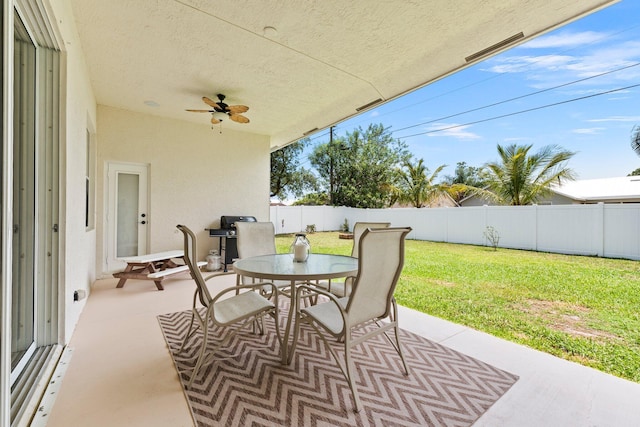 3552 SW Dellamano St, Port Saint Lucie, FL 34953 - view of patio featuring a ceiling fan and outdoor dining space