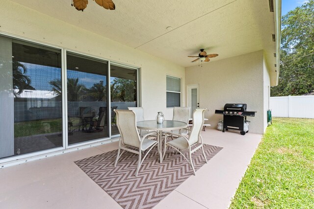 3552 SW Dellamano St, Port Saint Lucie, FL 34953 - view of patio with a ceiling fan, area for grilling, and outdoor dining space
