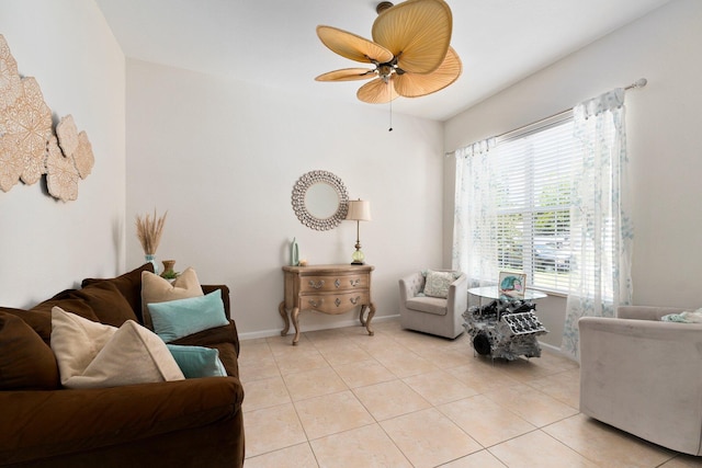 3552 SW Dellamano St, Port Saint Lucie, FL 34953 - living room featuring light tile patterned floors, a ceiling fan, and baseboards