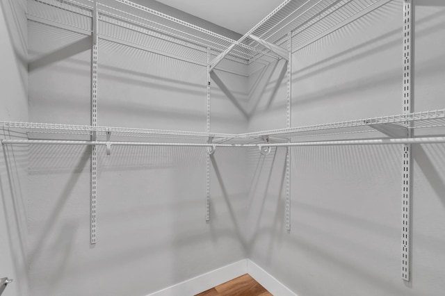125 E Hart St, Lantana, FL 33462 - spacious closet featuring wood finished floors