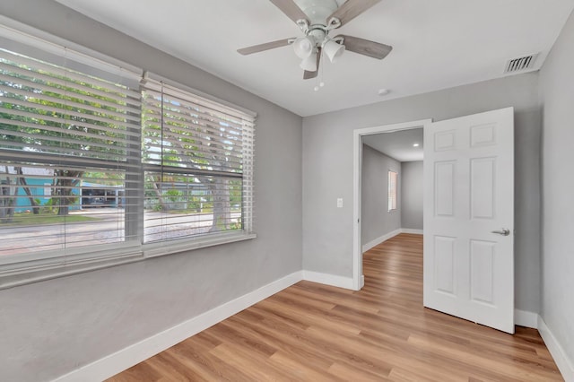 125 E Hart St, Lantana, FL 33462 - spare room featuring baseboards, ceiling fan, and light wood-style floors