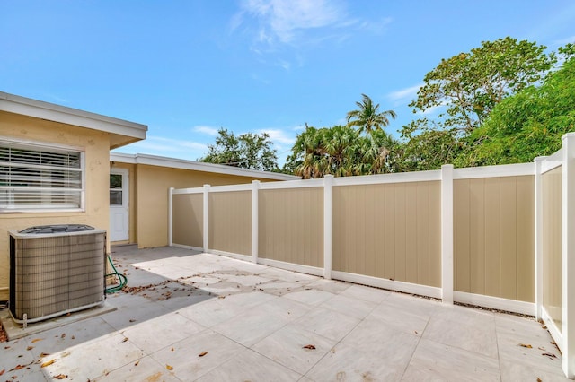 125 E Hart St, Lantana, FL 33462 - view of patio / terrace featuring central AC unit