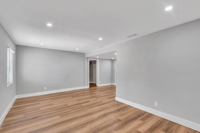 125 E Hart St, Lantana, FL 33462 - spare room featuring recessed lighting, baseboards, and light wood-style floors