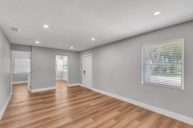 125 E Hart St, Lantana, FL 33462 - unfurnished room featuring baseboards, light wood-style flooring, and recessed lighting