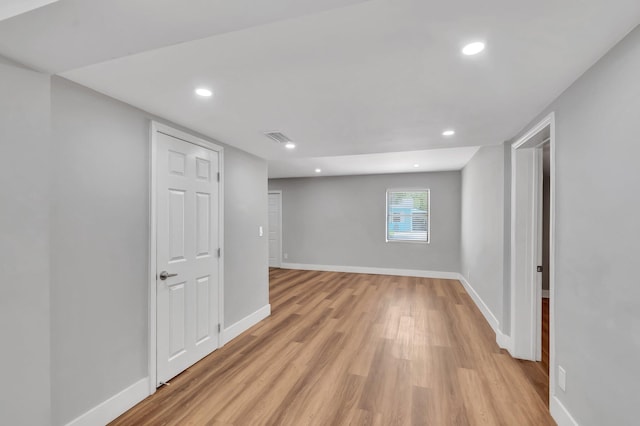125 E Hart St, Lantana, FL 33462 - basement featuring light wood-style floors, baseboards, and recessed lighting
