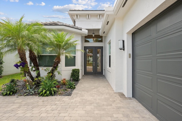 12582 Copper Mountain Pass, Boynton Beach, FL 33473 - property entrance with french doors and stucco siding