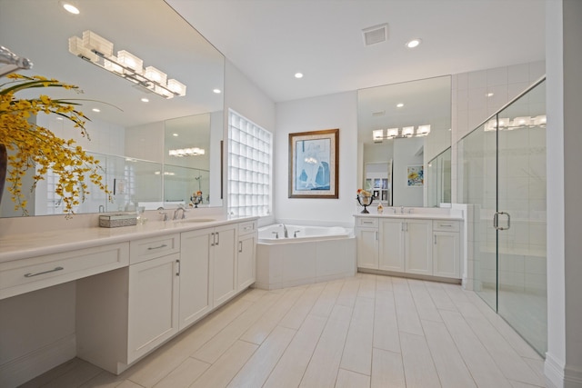 12582 Copper Mountain Pass, Boynton Beach, FL 33473 - full bathroom with a garden tub, two vanities, a stall shower, and recessed lighting