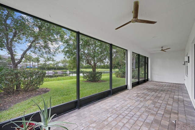 12582 Copper Mountain Pass, Boynton Beach, FL 33473 - unfurnished sunroom with a water view, ceiling fan, and healthy amount of natural light